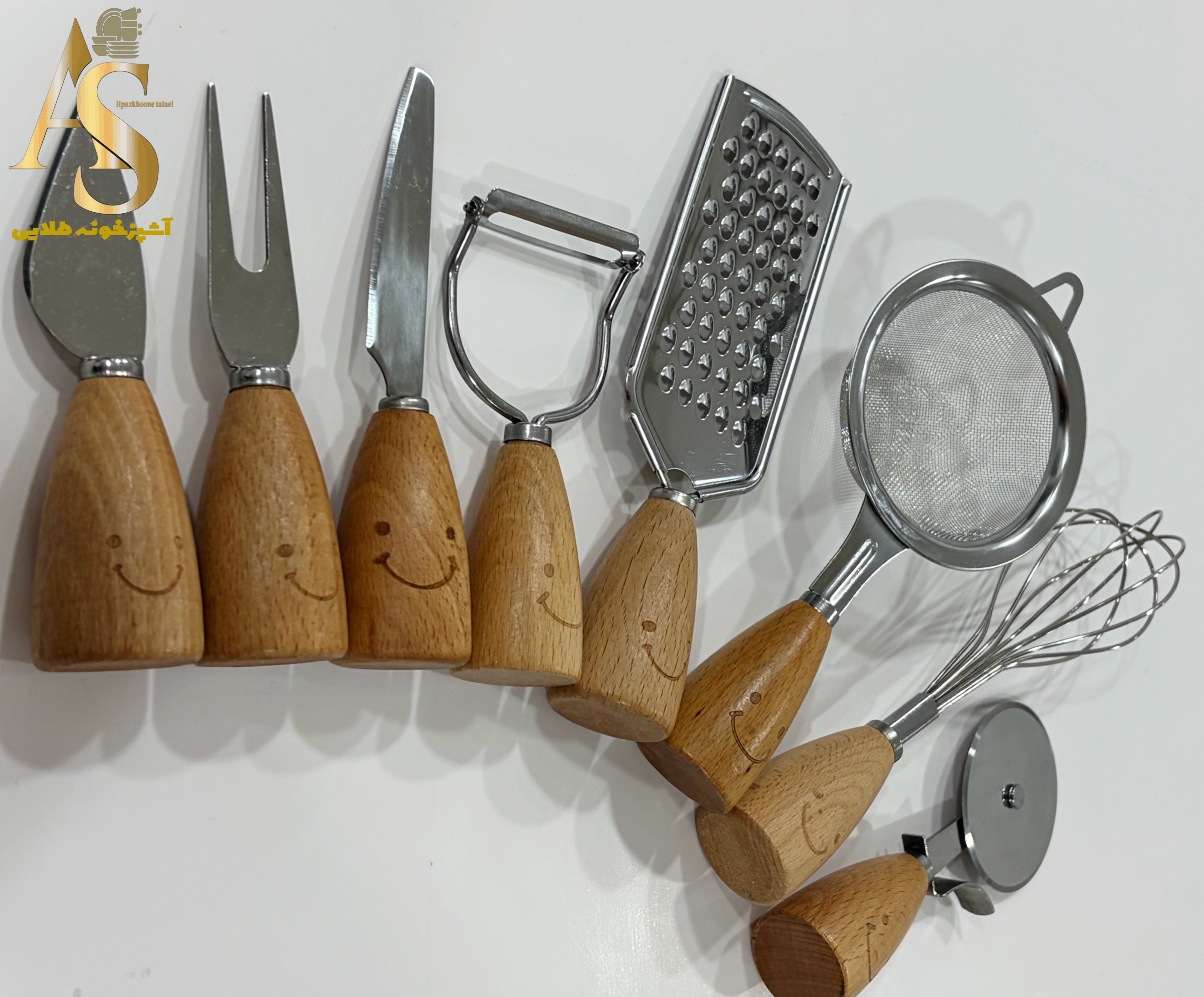 ابزار آشپزخانه استیل دسته چوبی لبخند